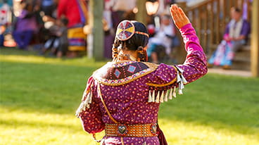 Local District Consultation icon displaying an image of female powwow dancer with right hand raised