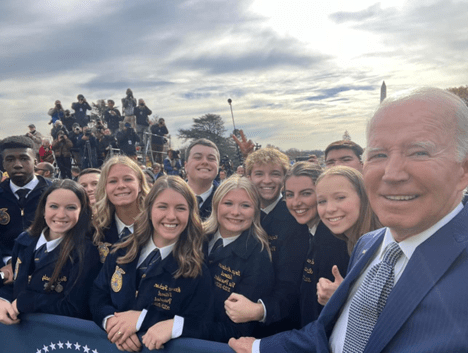 group of high school students with President Biden