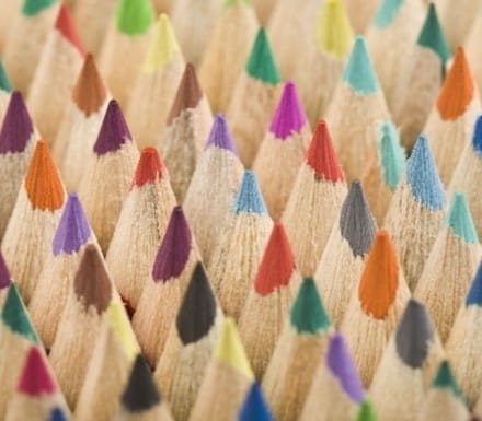 Close-up of the tips of dozens of colored pencils
