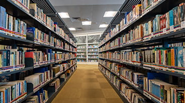 Library aisle with books on either side