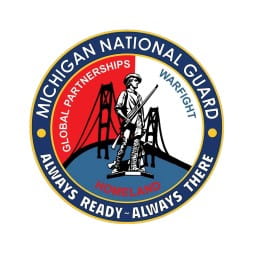 Circular red, white and blue logo for the Michigan National Guard State Tuition Assistance Program