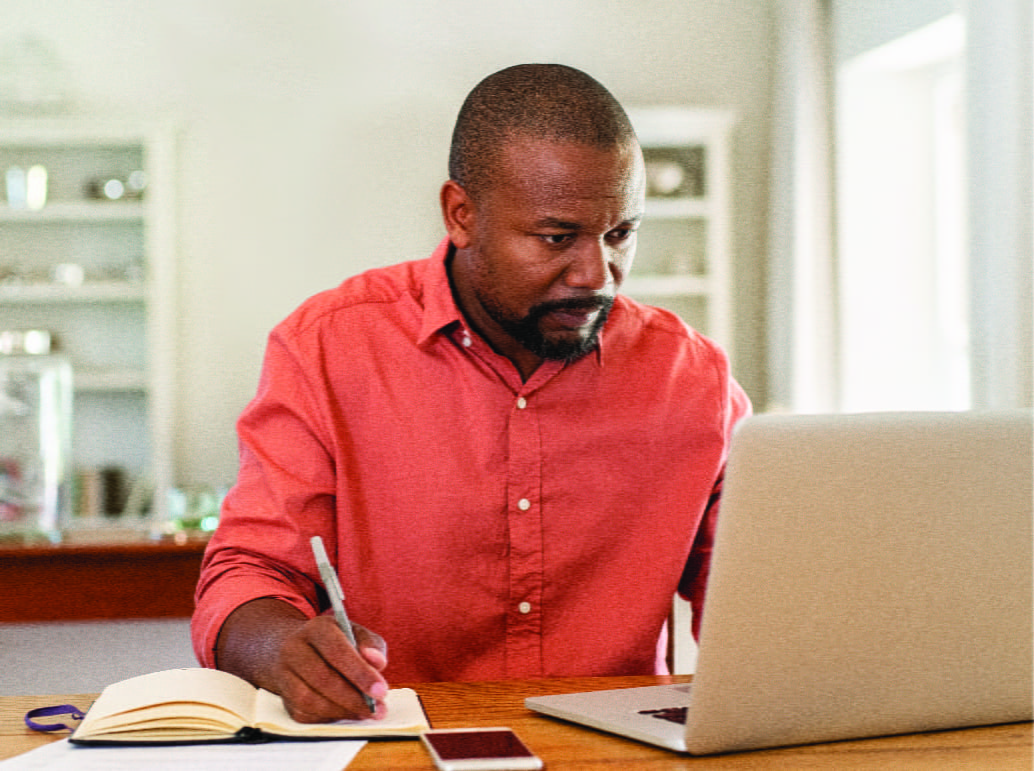 man working at a computer