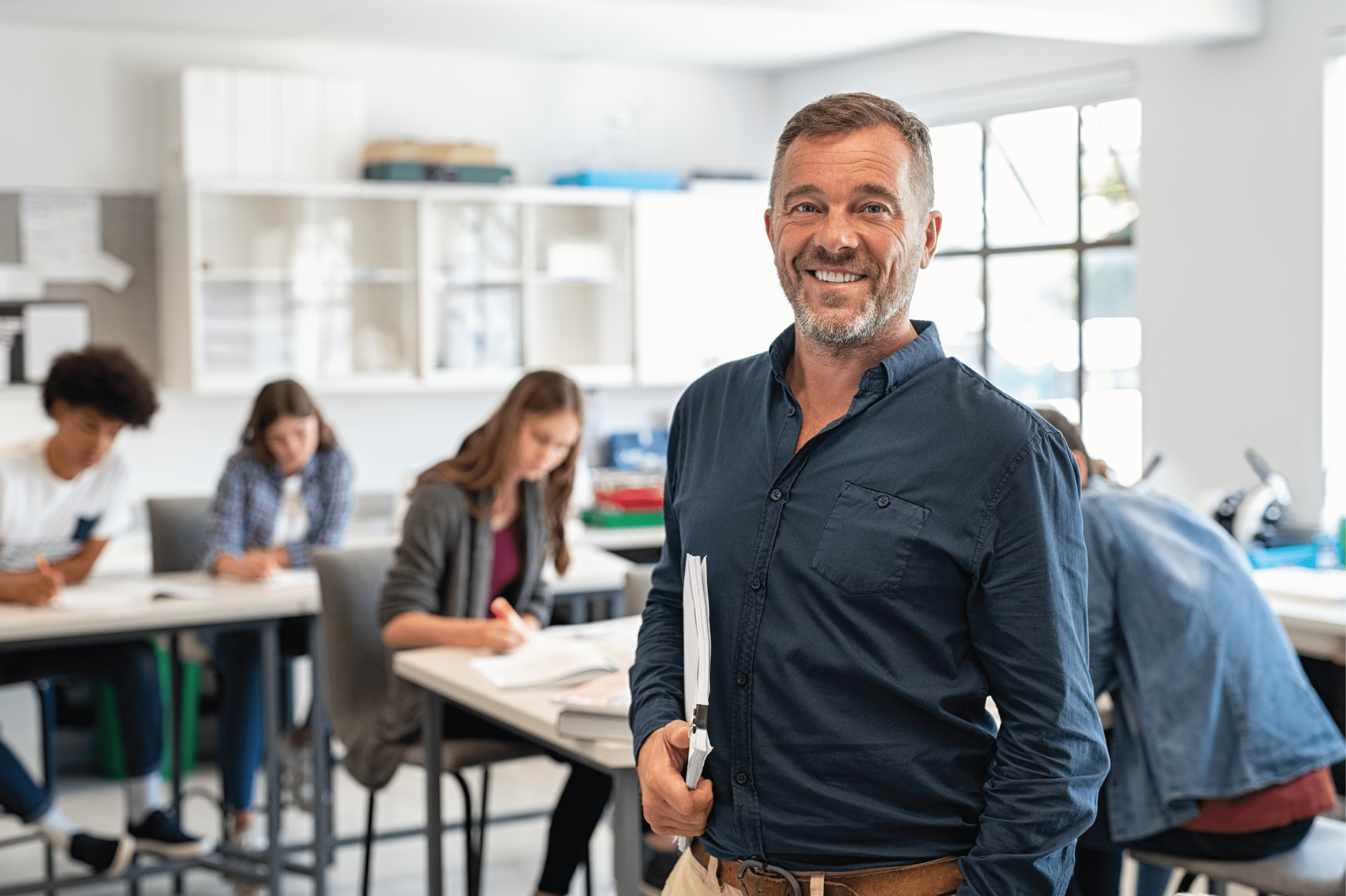 man standing in front of class