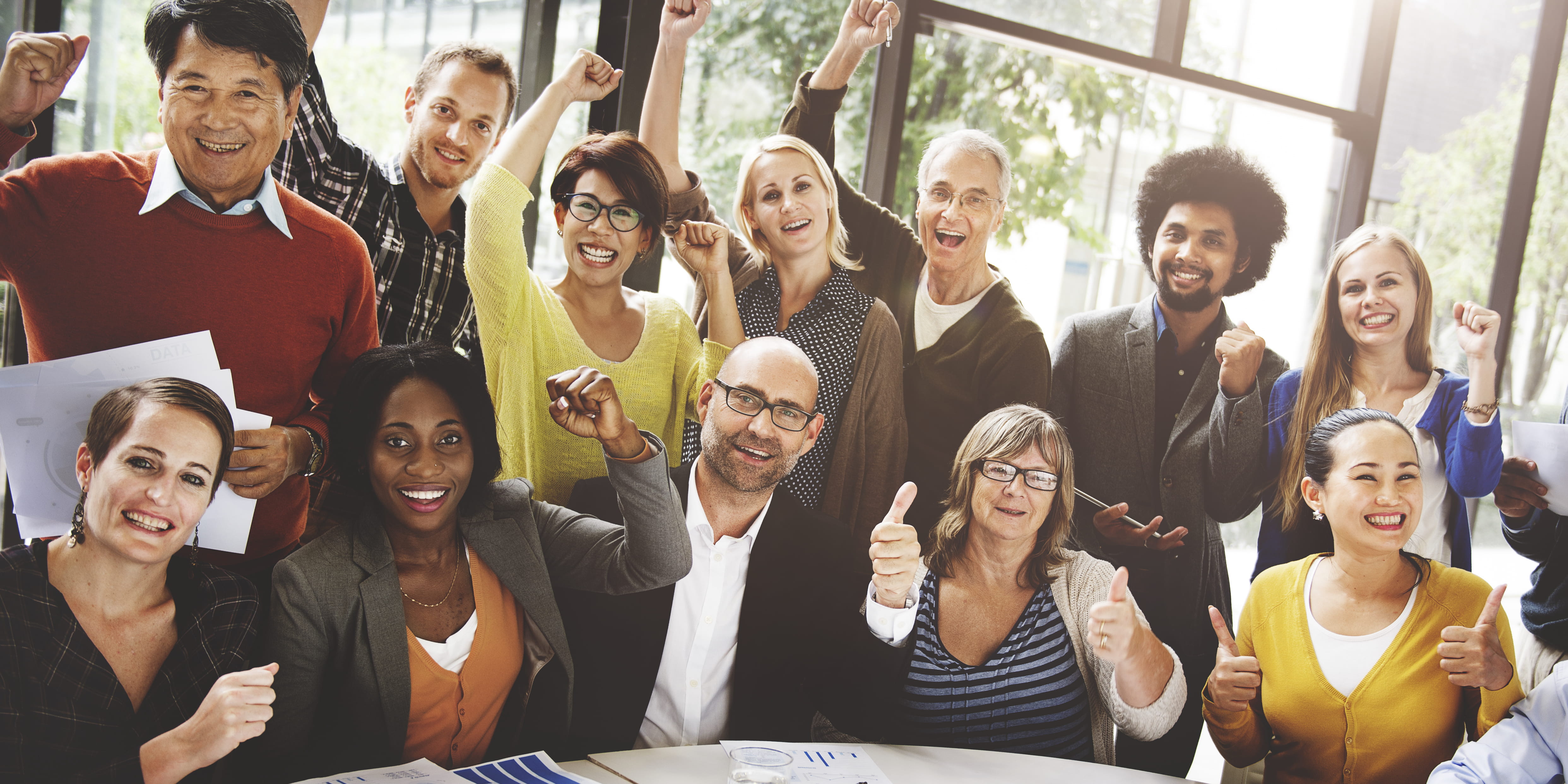 professionals with thumbs up