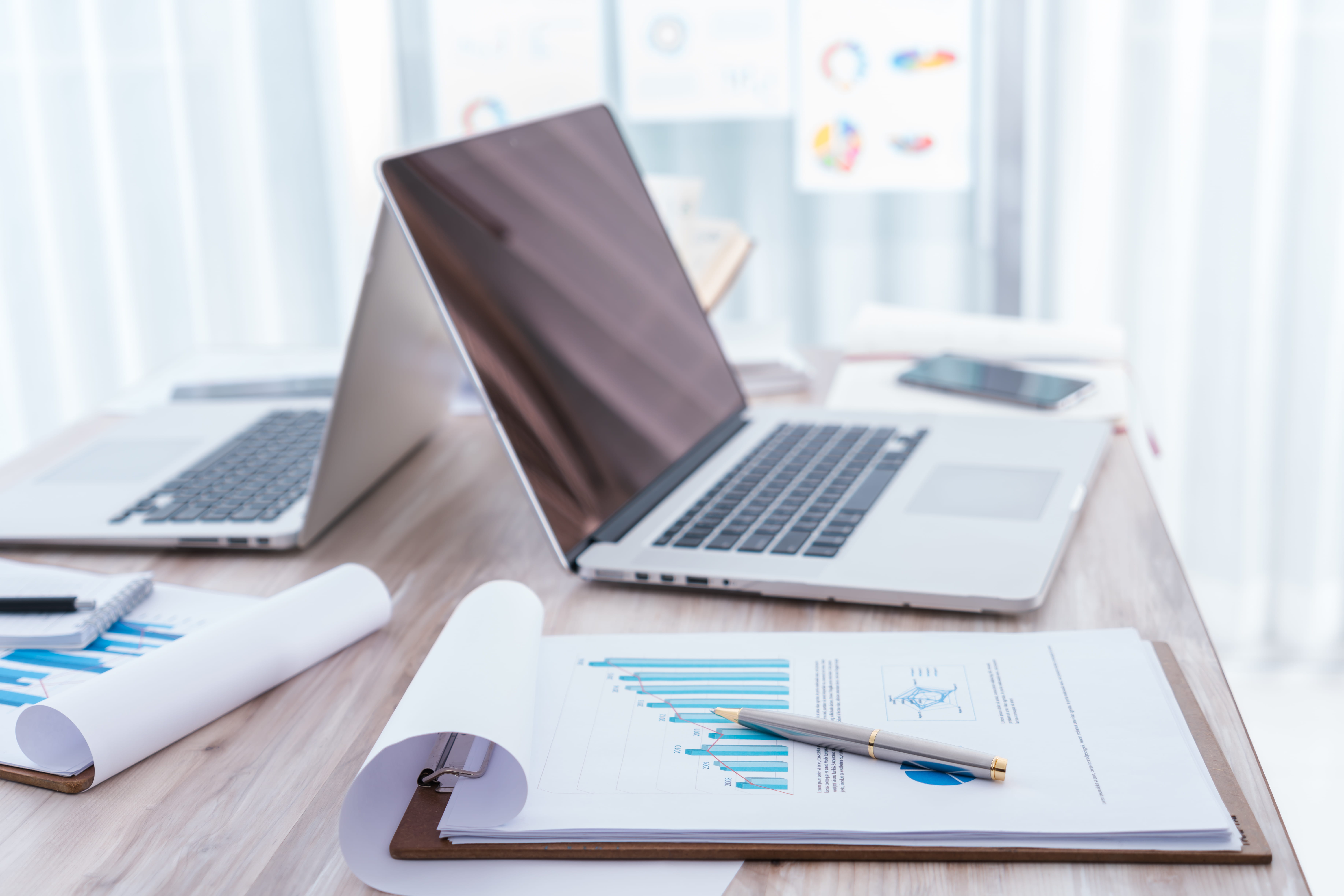 computer and paper reports
