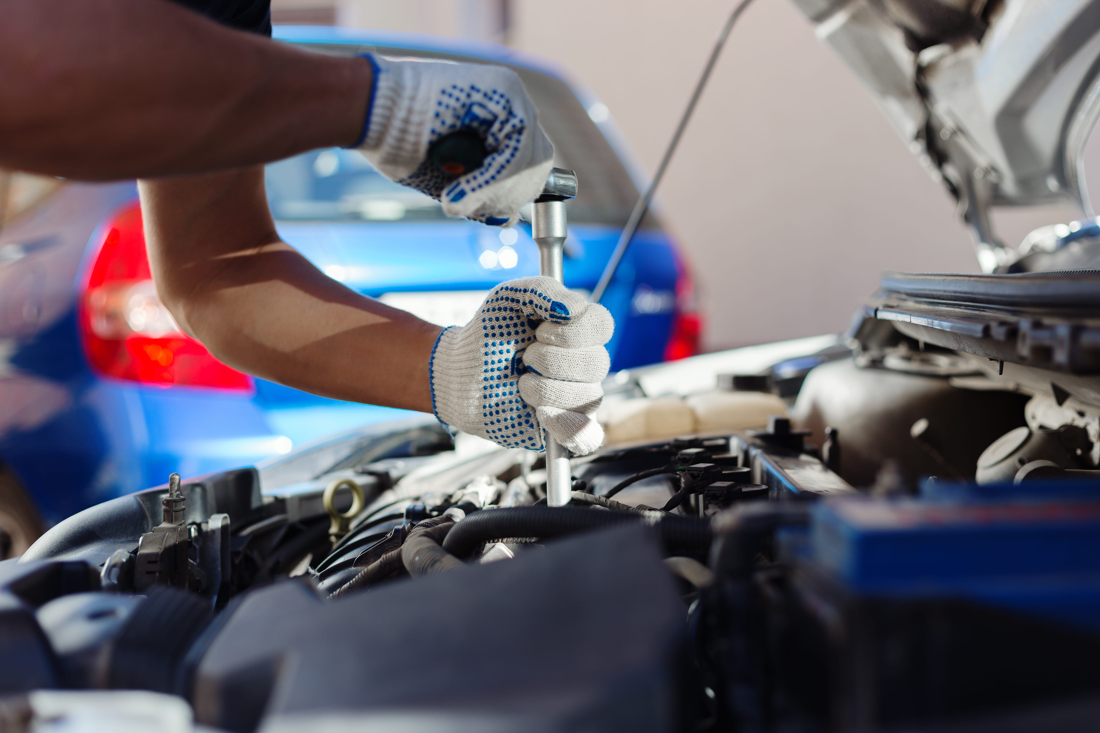 mechanic working on car