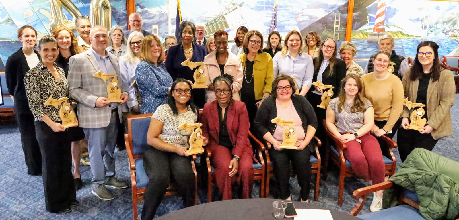 2025 Jean Chabut Health Policy Champion and Hometown Health Heroes awardees pose with Michigan Public Health Week partners.