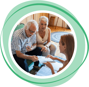 Woman showing paper to senior couple