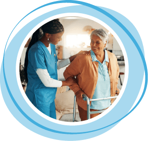 Nurse helping senior woman with walker