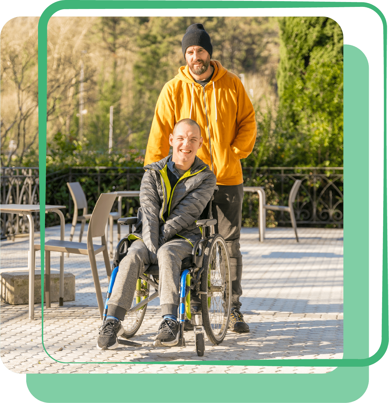 Care provider with man in wheelchair