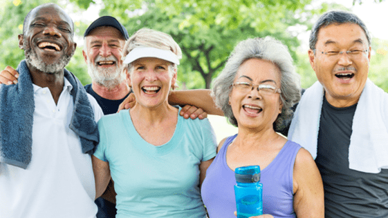 Photo of five seniors smiling after a workout.
