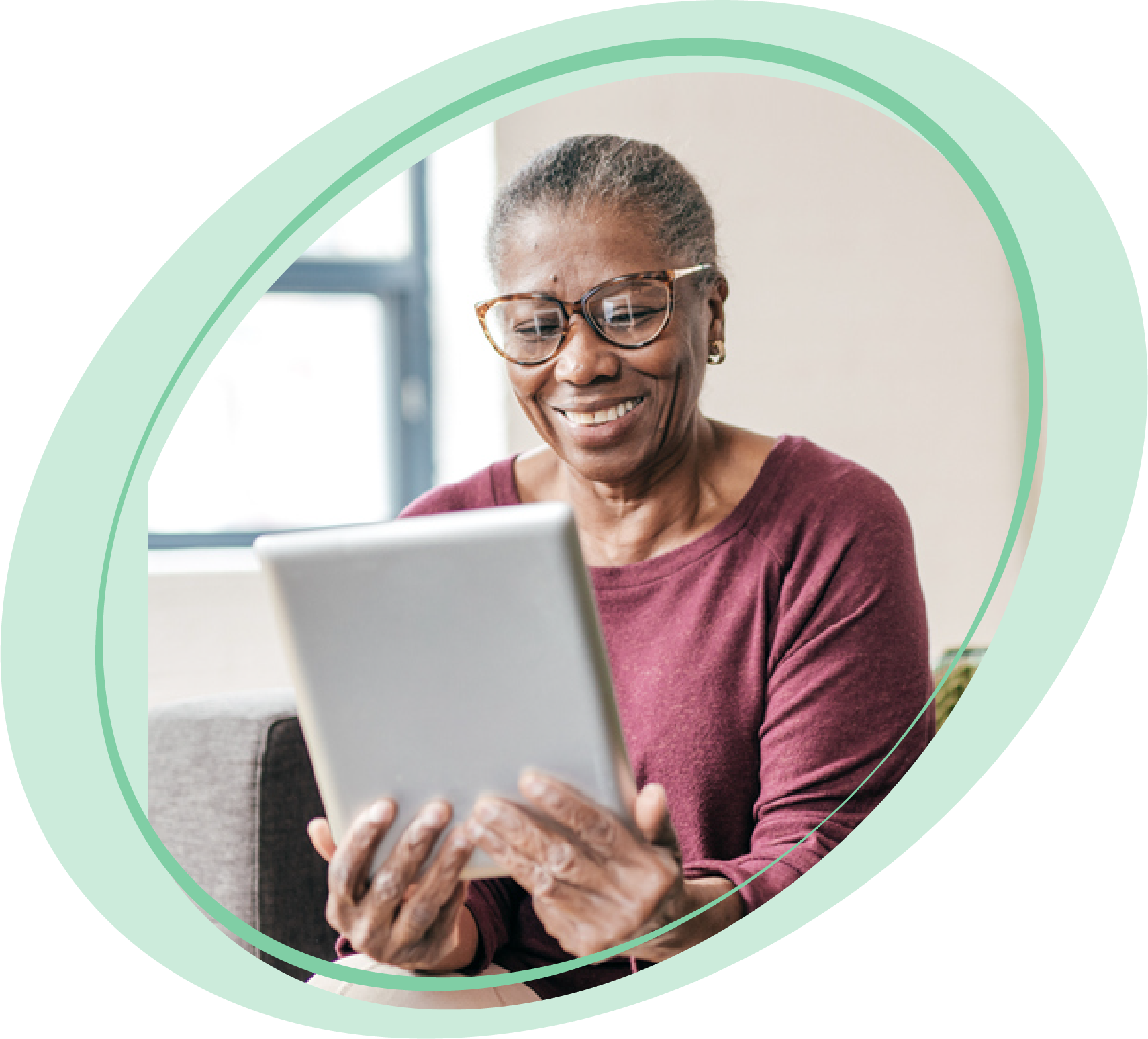 Woman looking at tablet.