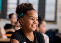 Child with Bone Conduction hearing device