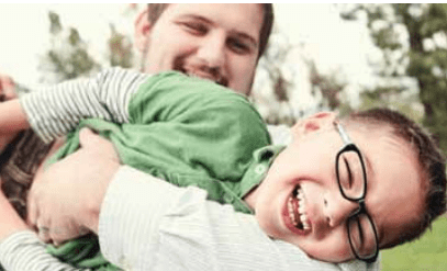Smiling Kid with Glasses