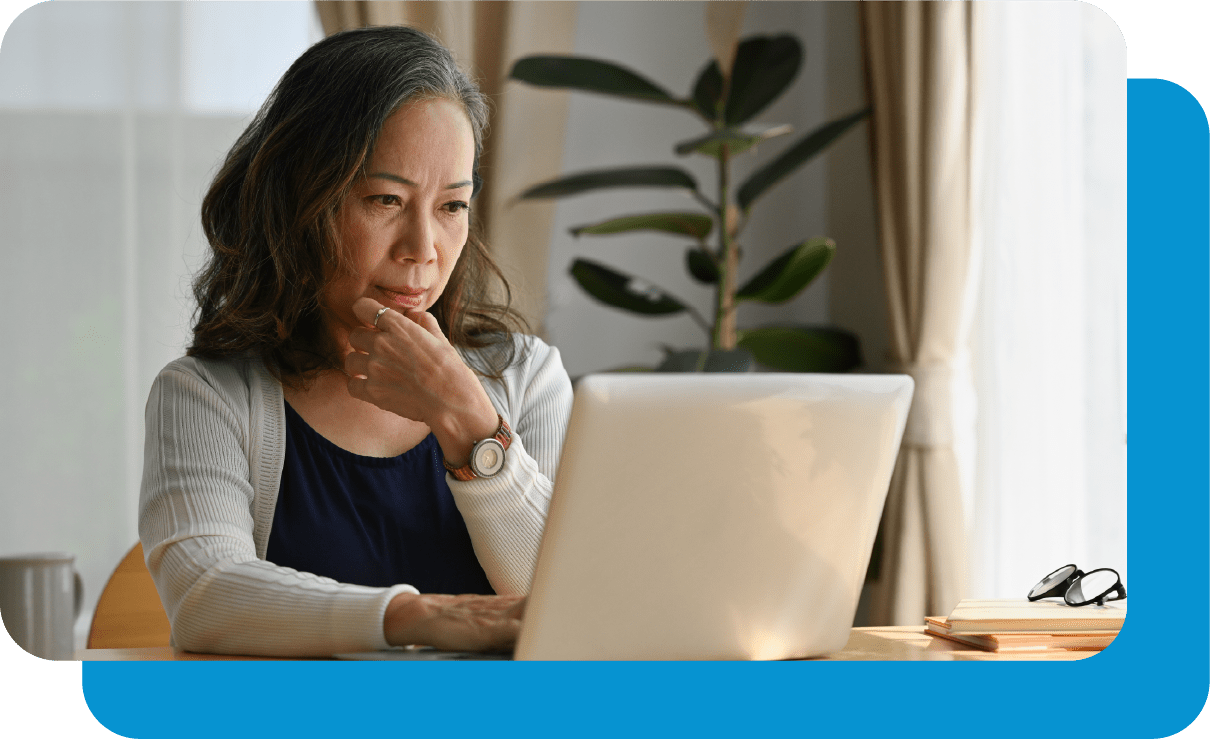 woman looking at laptop