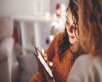 Friends looking at a a digital device