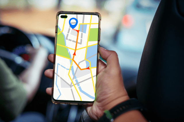 Person holding phone with navigation 