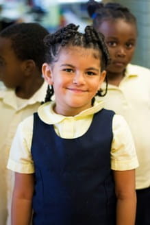 Little girl in school uniform