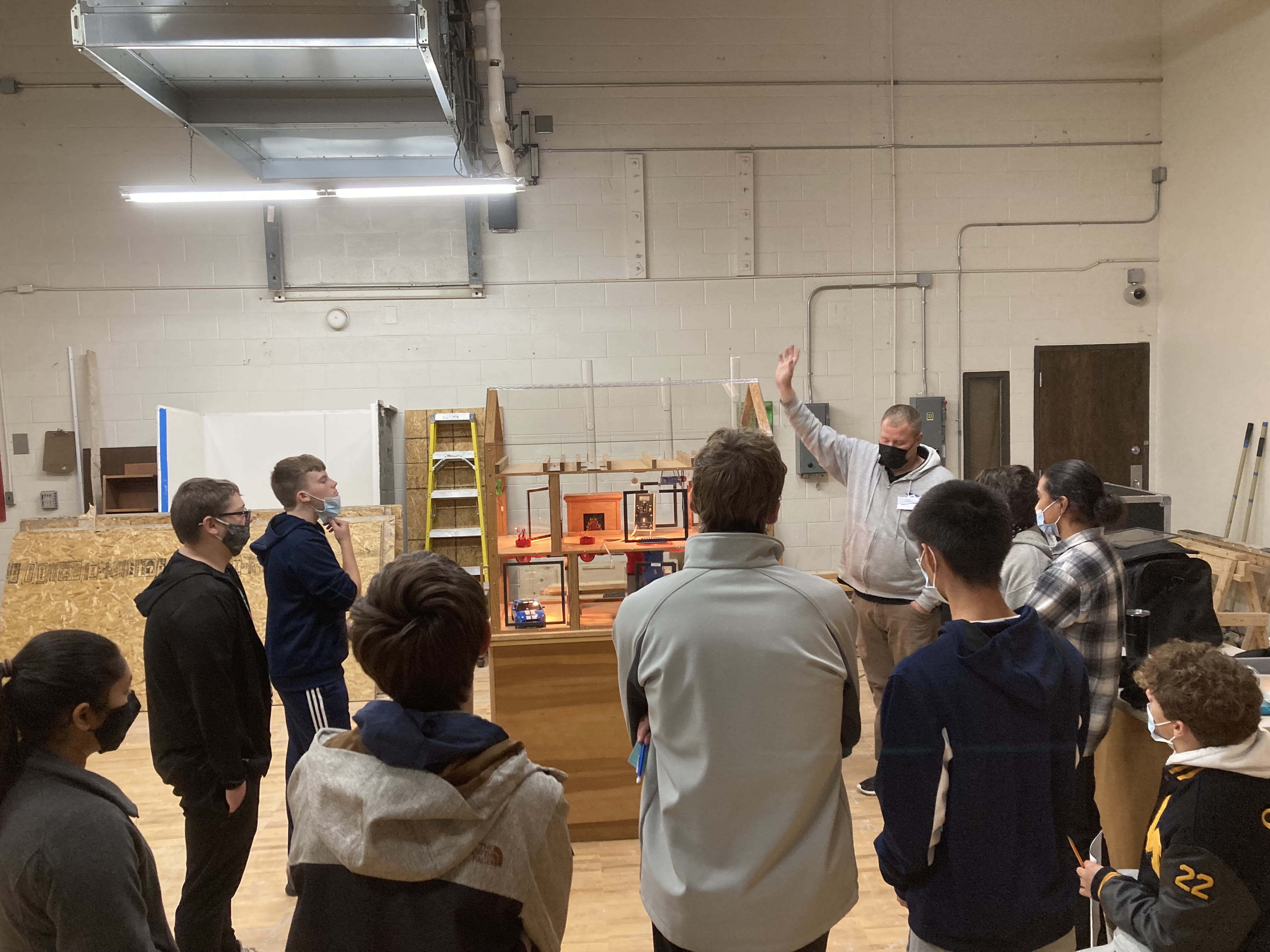 A MiTEC instructor presenting to high school students