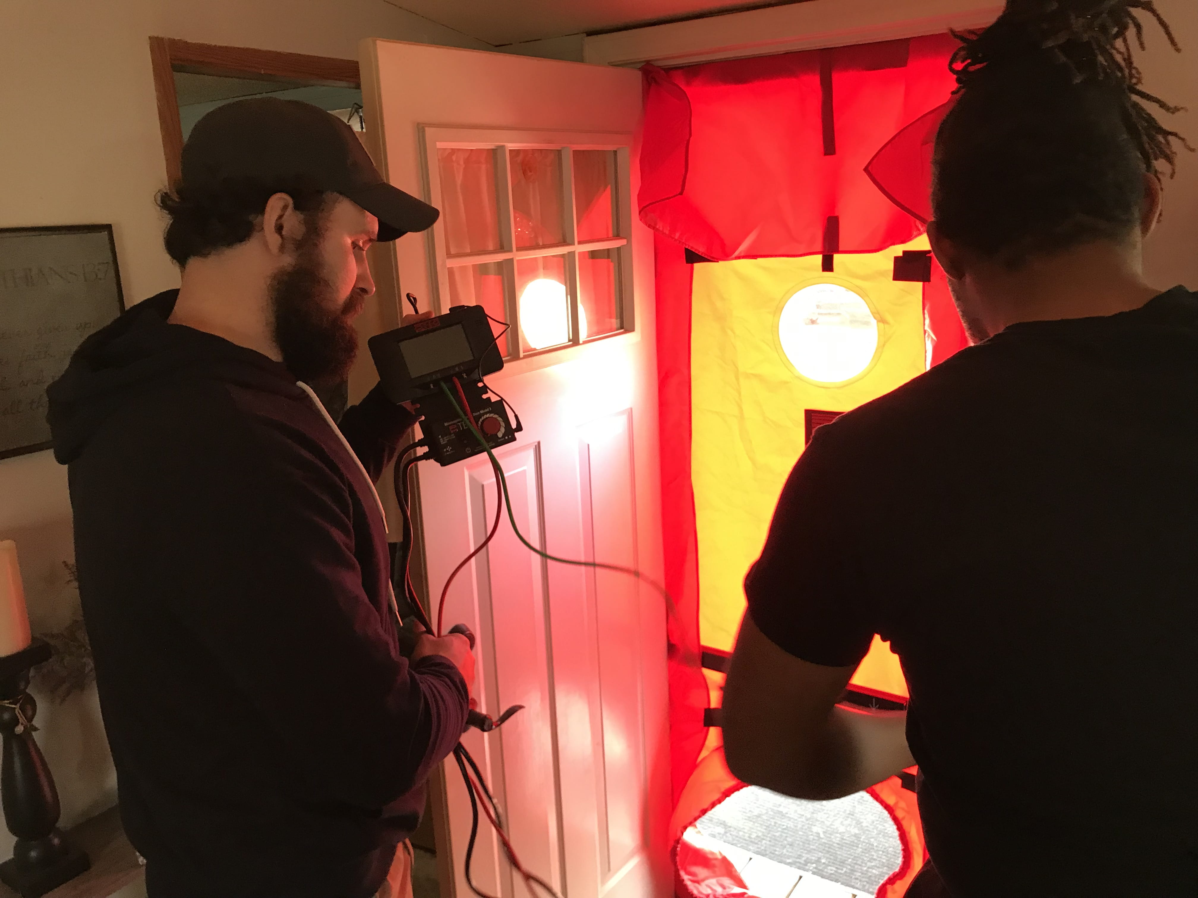 Aspiring Energy Auditors training on the Blower Door