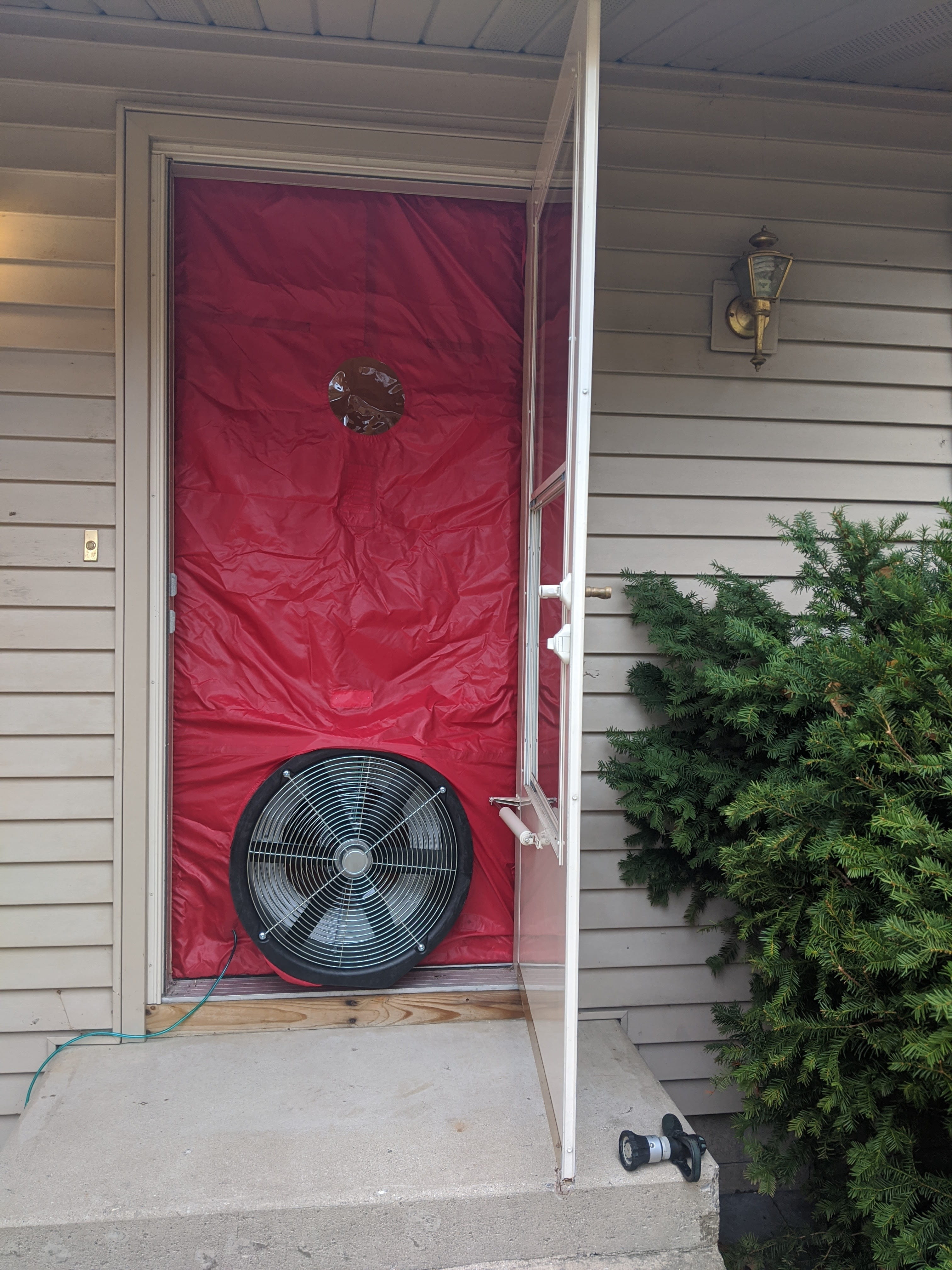 Blower Door set up in the front doorway