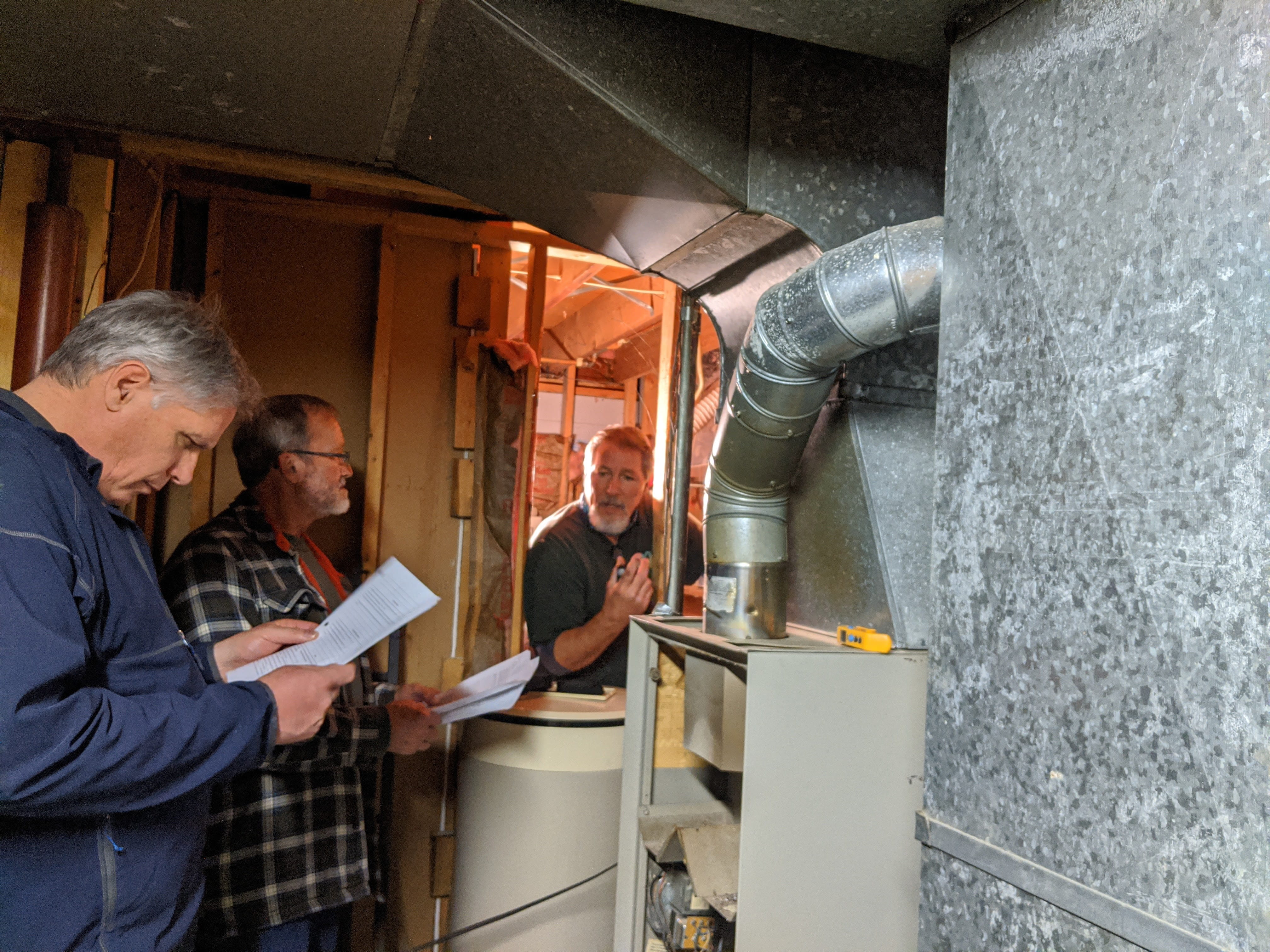Energy Auditor instructor discussing furnace efficiency