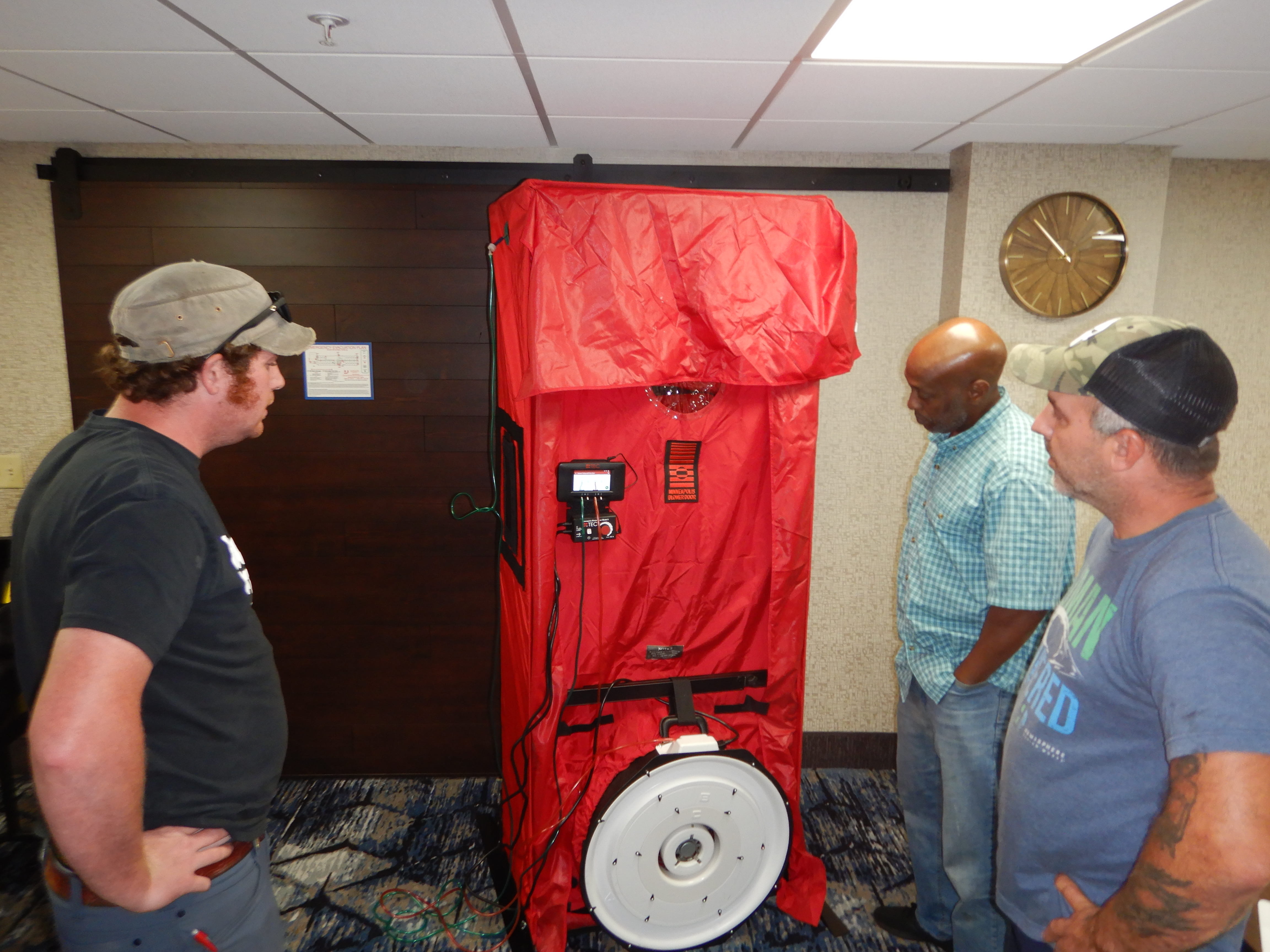 Students learning Blower Door basics