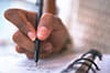 Hand writing in notebook Hand writing in notebook