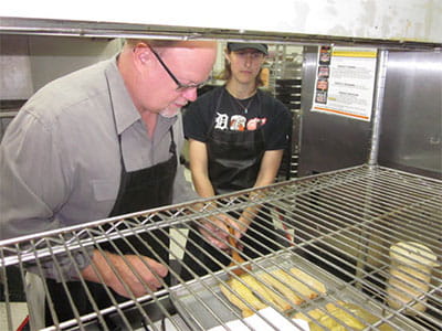 state rep making pizza
