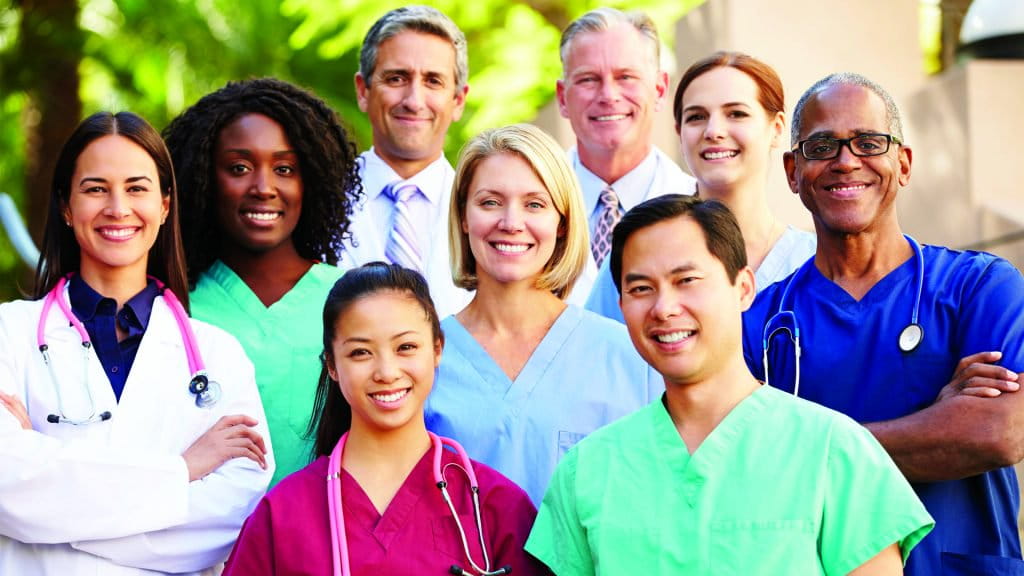 Nurses in multiple-colorful outfits