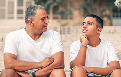 Father and son talking