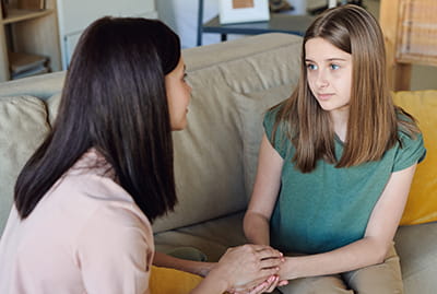 Mom and daughter talking