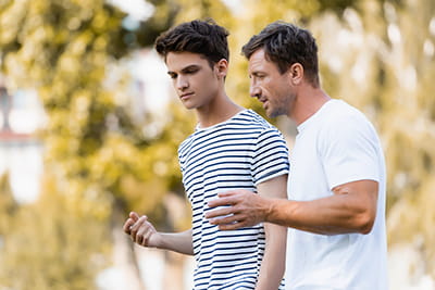 Father talking to son