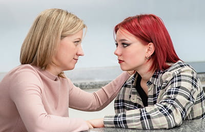 Mom and daughter talking