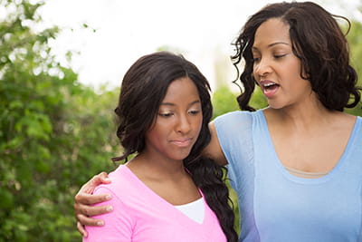Mother and daughter talking