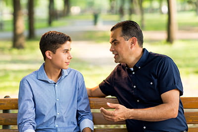 Father and son talking