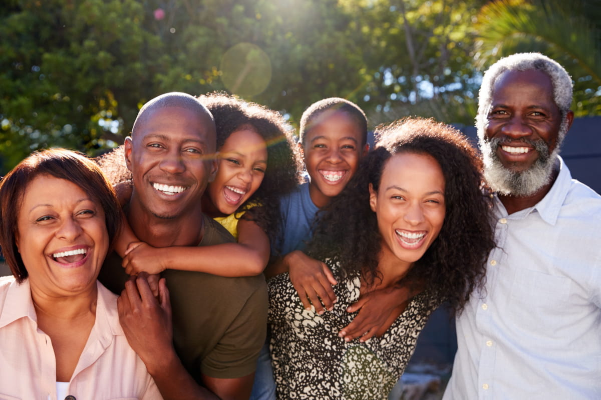 Portrait of multi-generational family in outdoor garden