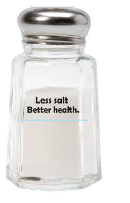 glass salt shaker with salt inside and 