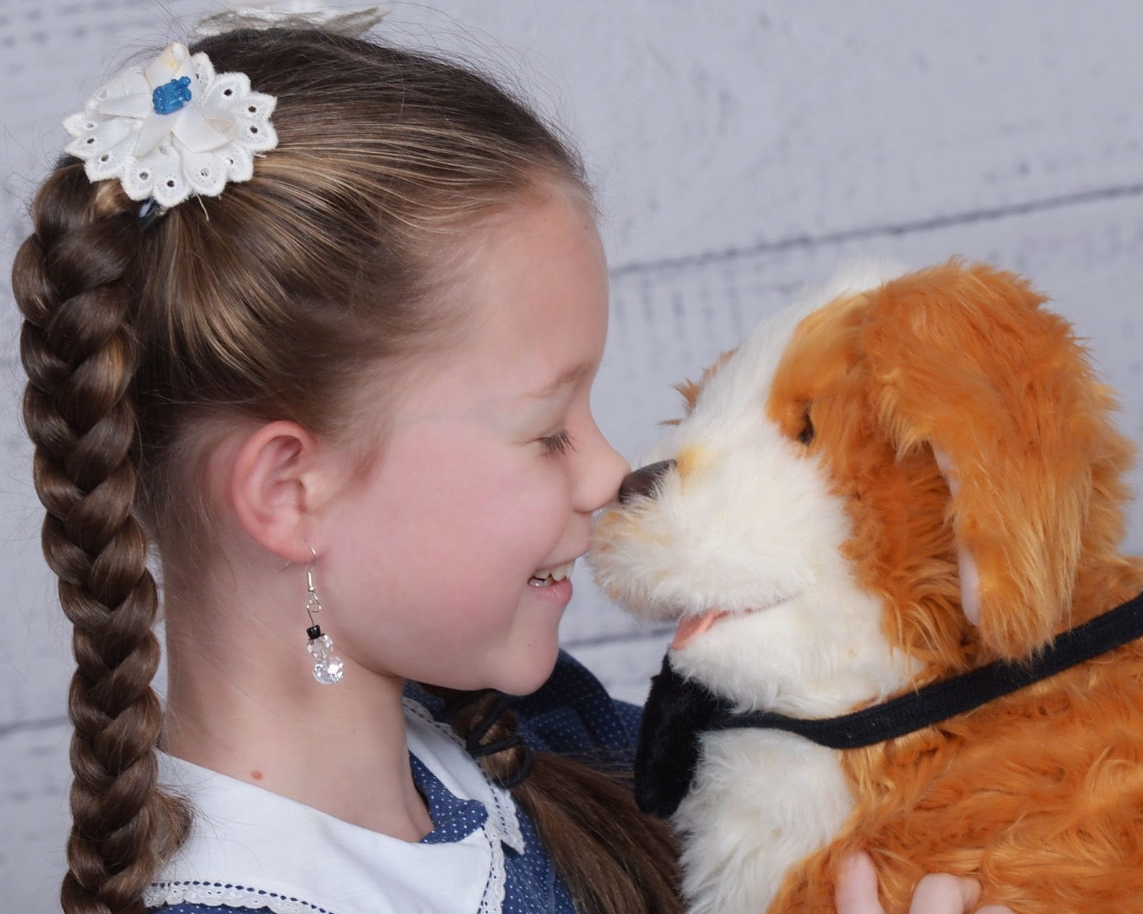 A photo of Laura holding her robotic dog