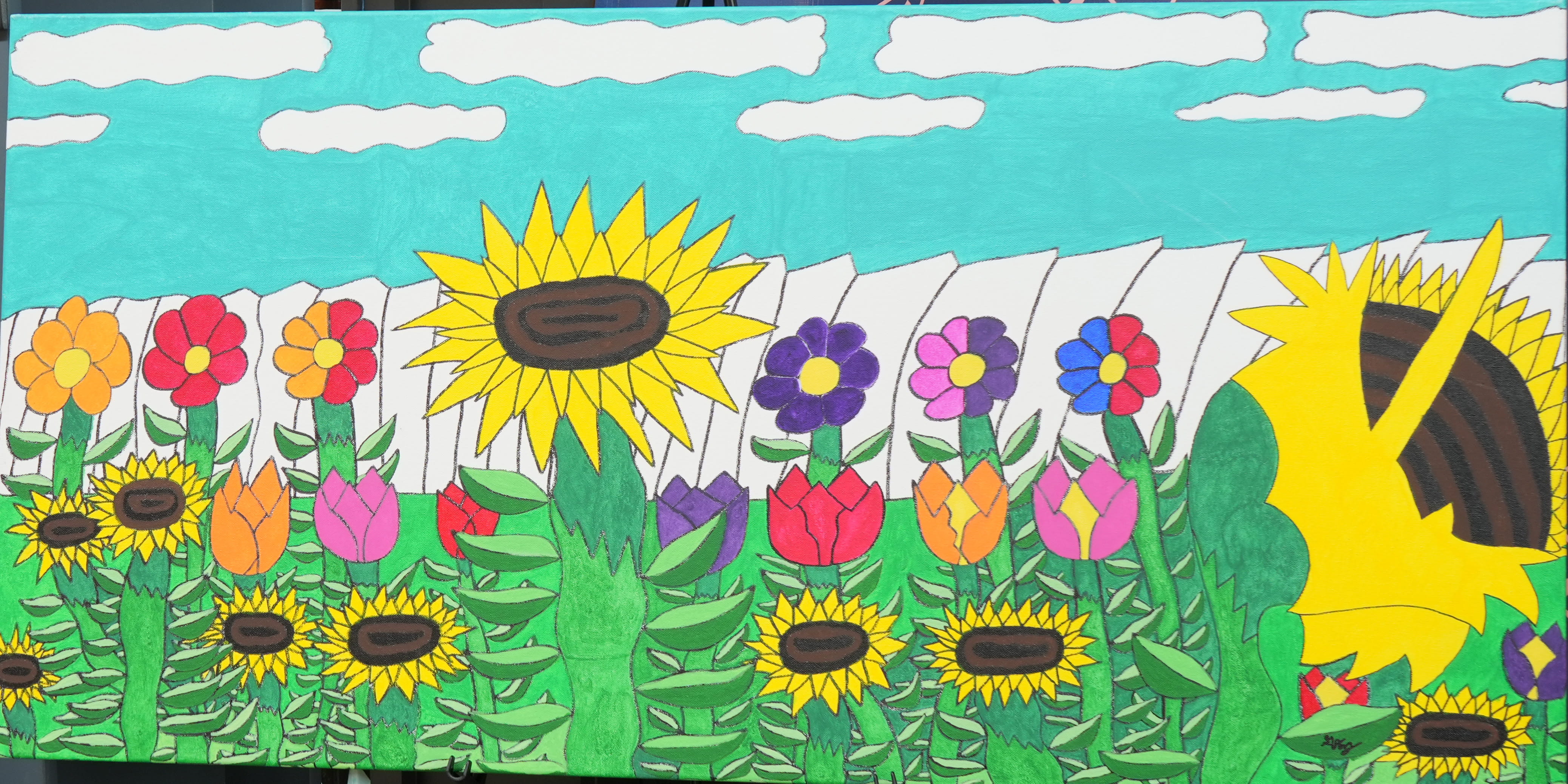 Artist: Garrett Jones. Title of Artwork: Gated Spring Garden. Artist Description: White fence with several different types of brightly colored flowers