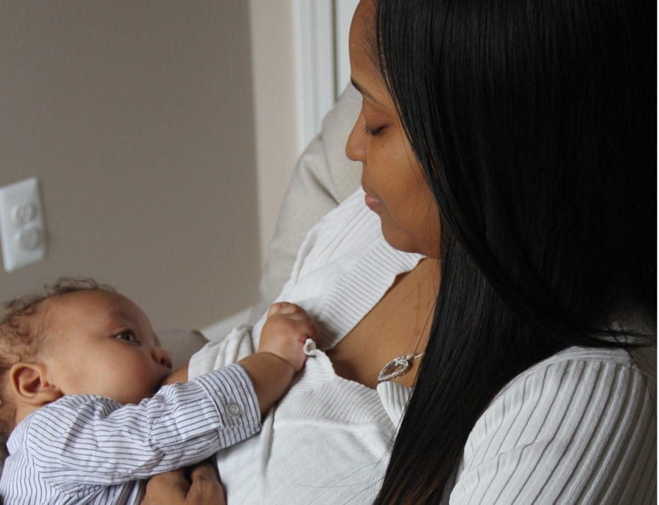 Person breastfeeding an infant