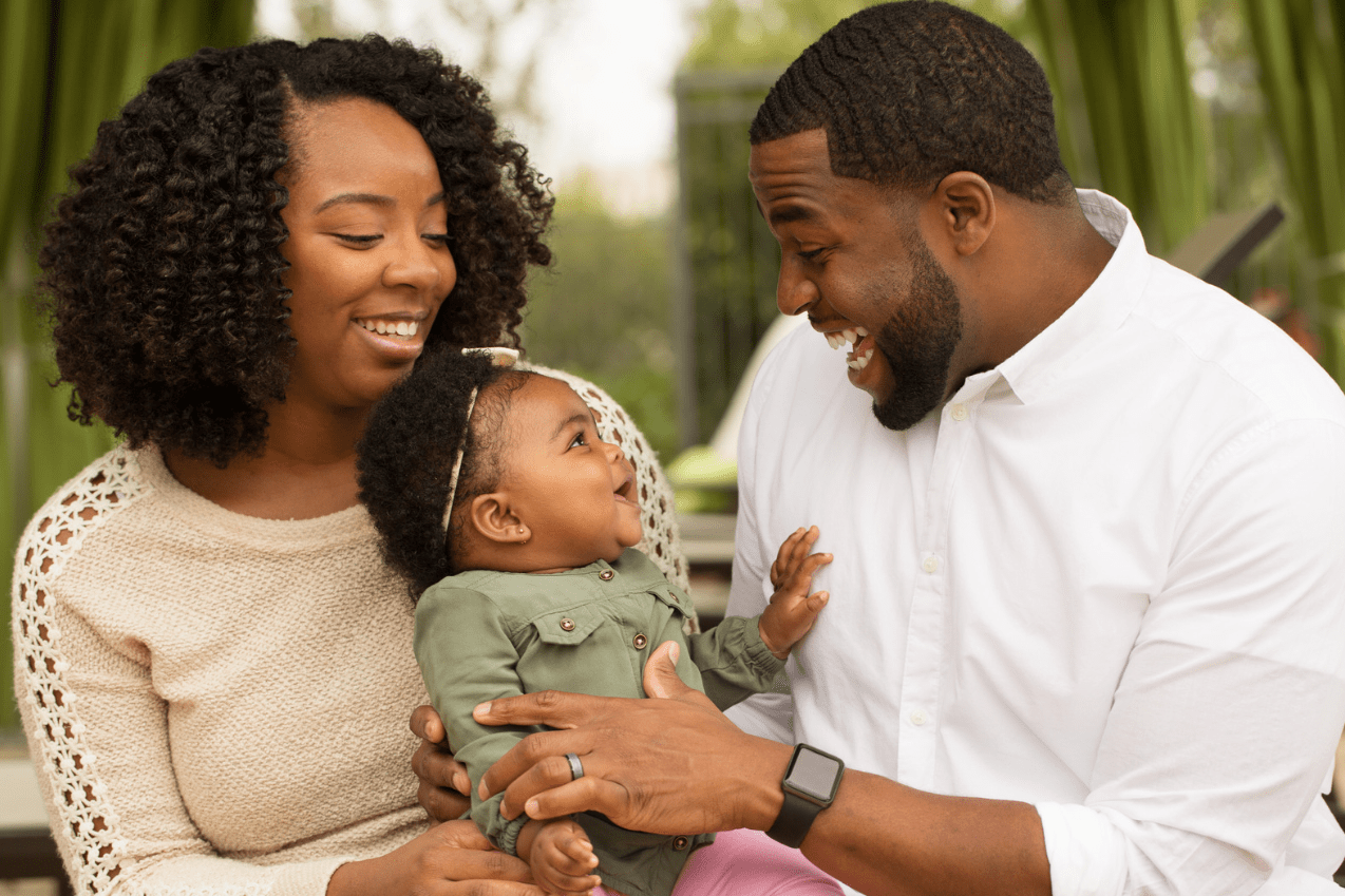 Happy family with infant