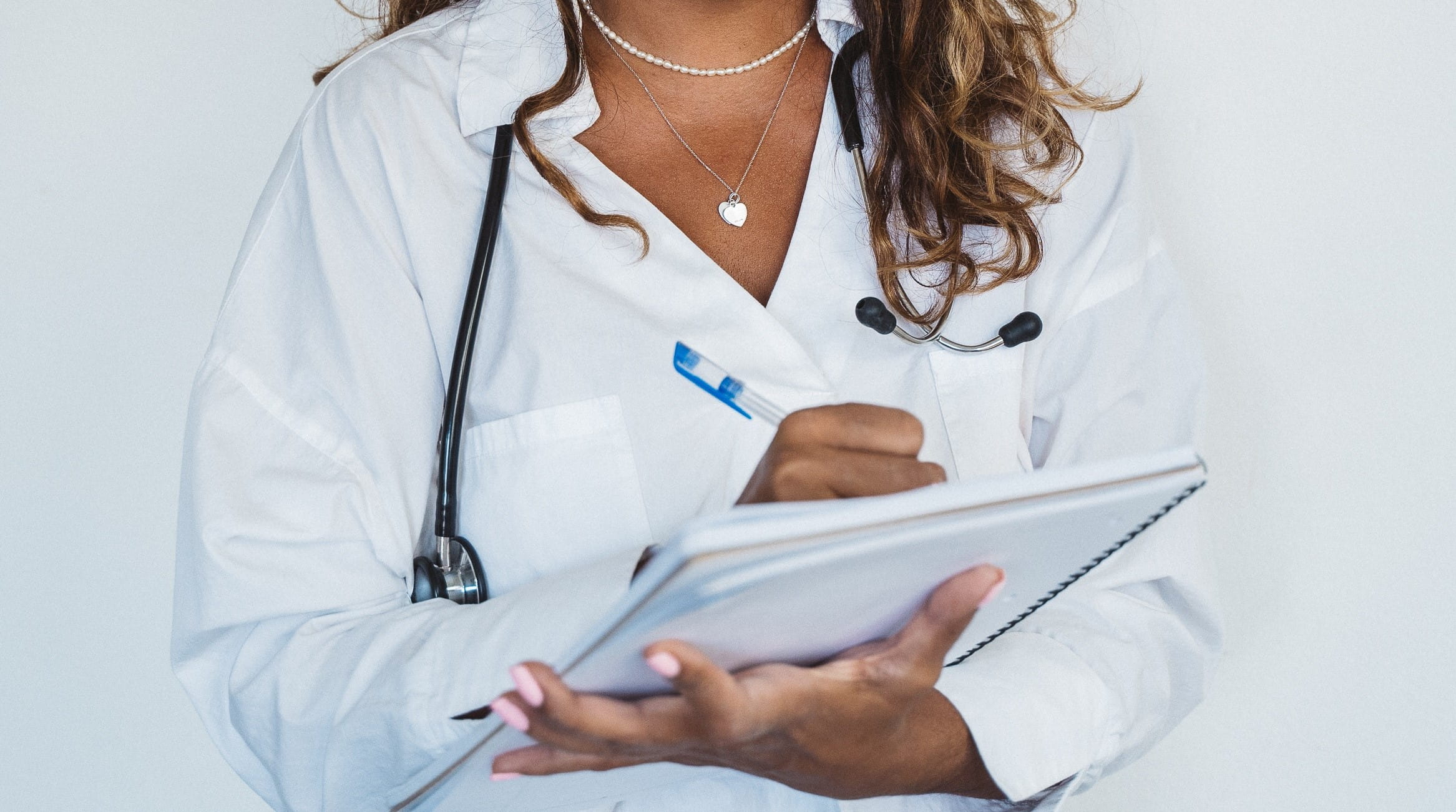 Clinical person wearing a stethoscope 