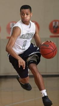 Boy dribbling basketball