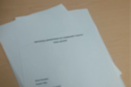 Stack of printed documents on a table
