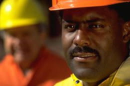 Two workers wearing hardhats
