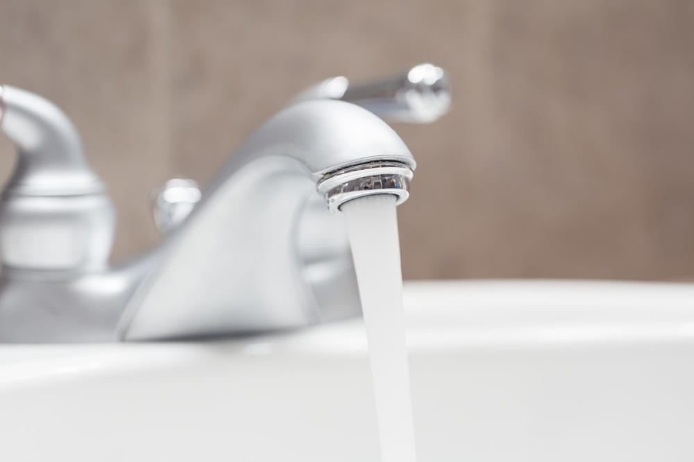 Bathroom faucet with water running