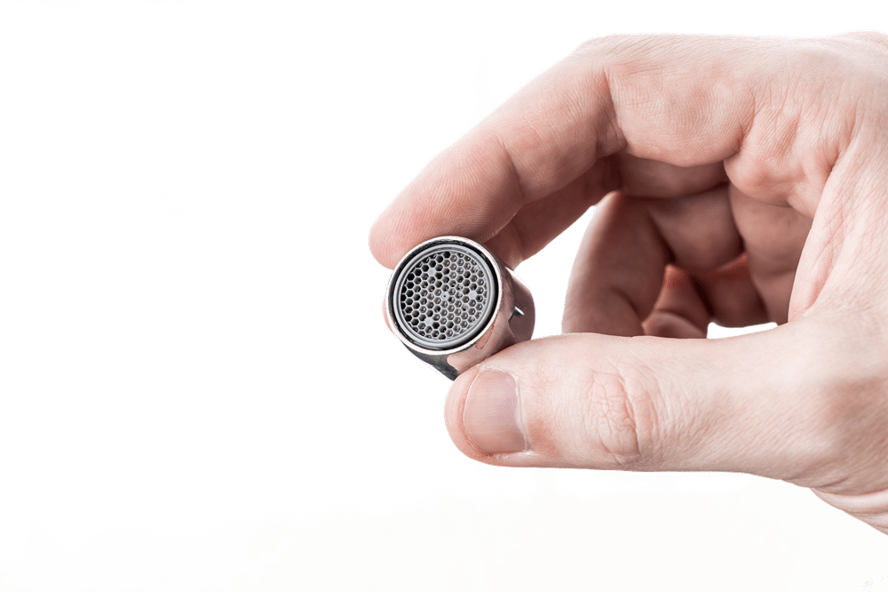 Hand holding aerator