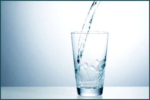 Water pouring into a glass