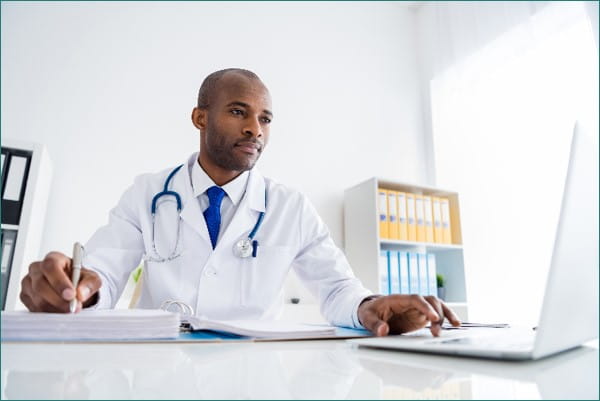 doctor using a laptop